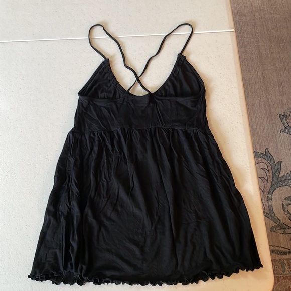 Black shirt. With straps that criss cross in the back. Sz small - Picture 3 of 7